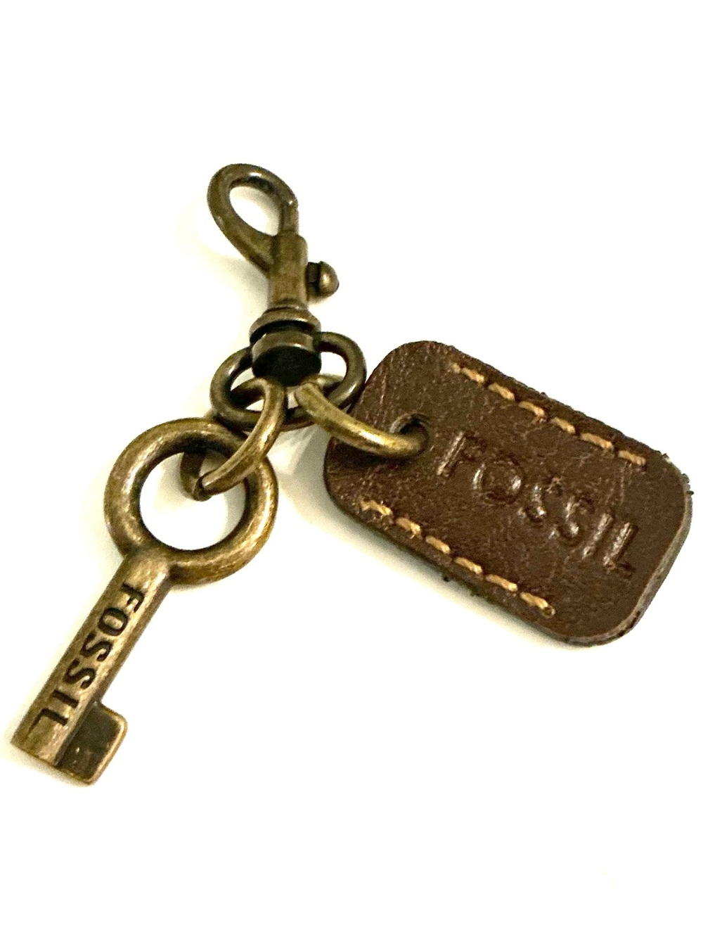 FOSSIL, Brass Key Charm with Brown Leather Tag Accent